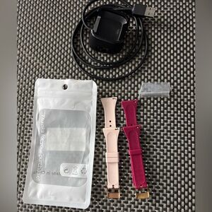 2 Fitbit Versa bands plus charger